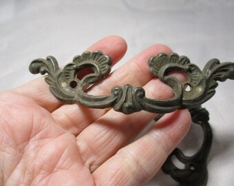 A Set of Three, Vintage SWAG Drawer Pulls with Feathery Plumes.