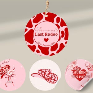May include: A set of pink and red party decorations. The main decoration is a round tag with a red cow print pattern and the text "Lauren's Last Rodeo". Additional stickers feature cowboy hats and party-themed graphics.