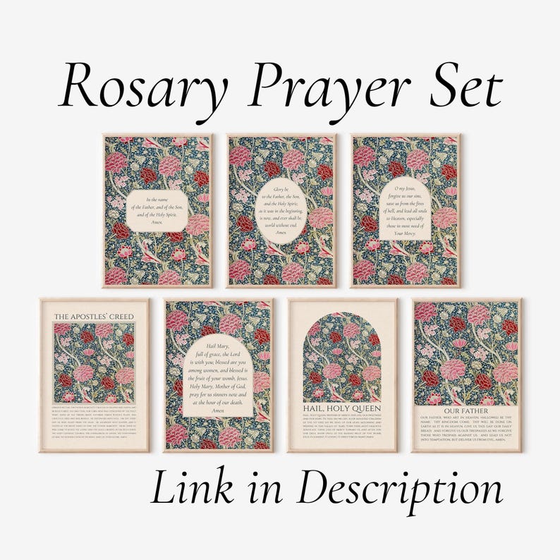 May include: A set of seven rectangular wall art prints titled Rosary Prayer Set. Each print features a dark blue background with pink and red floral patterns. The prints contain printed prayers including The Apostles' Creed, Hail Mary, and Our Father.
