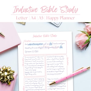 May include: A pink and white Inductive Bible Study planner with text, a pink pen, a pink notebook, and a wrapped gift with a gold bow. The text includes "Letter A4 A5 Happy Planner".