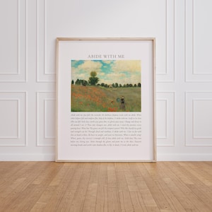 Puede incluir: Impresión artística enmarcada con un paisaje campestre de amapolas rojas, una mujer y un niño. El título es "ABIDE WITH ME" e incluye la letra del himno. El marco es de madera clara, creando un ambiente tranquilo.