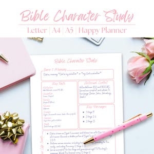 May include: A pink and white Bible Character Study planner page with text and a pink pen. The page includes sections for name and meaning, key texts, historical context, and key passages. A pink notebook, gift box, and flowers are also in the image.