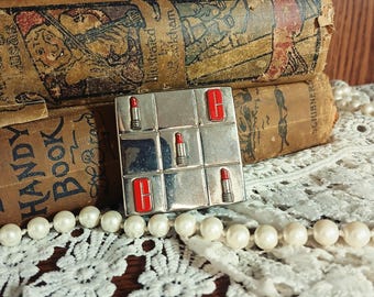Estuche compacto vintage RARO de Clinique Tic Tac Toe / Diseño de lápiz labial / Estuche de espejo de metal plateado de los años 90 / Artículo de colección de tocador / En perfecto estado