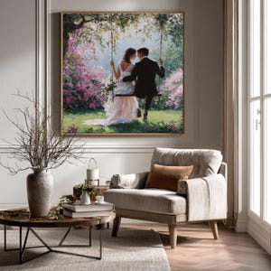 May include: A framed painting depicts a couple on a swing in a lush garden. The woman wears a white wedding dress, and the man is in a black suit. The scene is surrounded by pink flowers and green foliage, creating a romantic atmosphere.