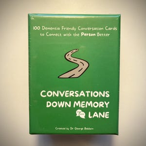 Conversaciones sobre el recuerdo: 100 tarjetas de conversación para personas con demencia que conectan mejor con la persona, creadas por el Dr. George Baldwin.