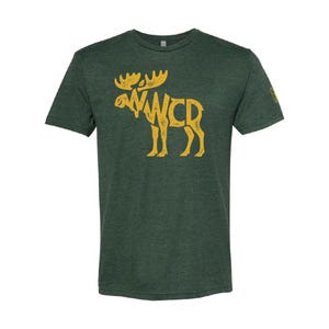 May include: A dark green heathered short-sleeve t-shirt featuring a distressed yellow graphic of a moose silhouette with the letters WCR integrated into the body of the animal. The design is centered on the chest of the crew neck garment.