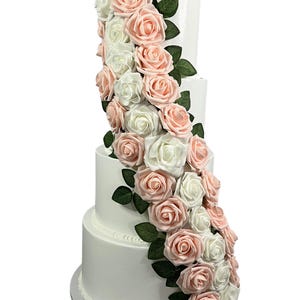 Four Tier Fake Cake with Pink and White Flowers