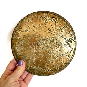 Vintage Brass over Wood Round Etched Trivet