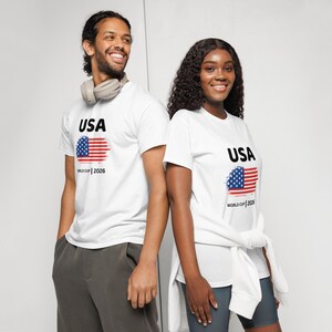 Close-up of 2026 USA World Cup shirt design – detailed view of 'USA' text and stylized American flag graphic, showcasing quality print and fabric