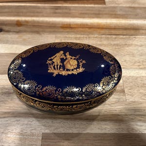 Limoges Porcelain Oval Cobalt Trinket Box with Gold Fragonard Scene