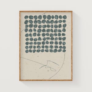 May include: A framed print with a beige background and a pattern of blue circles in the upper left corner. A thin, blue line curves across the background.