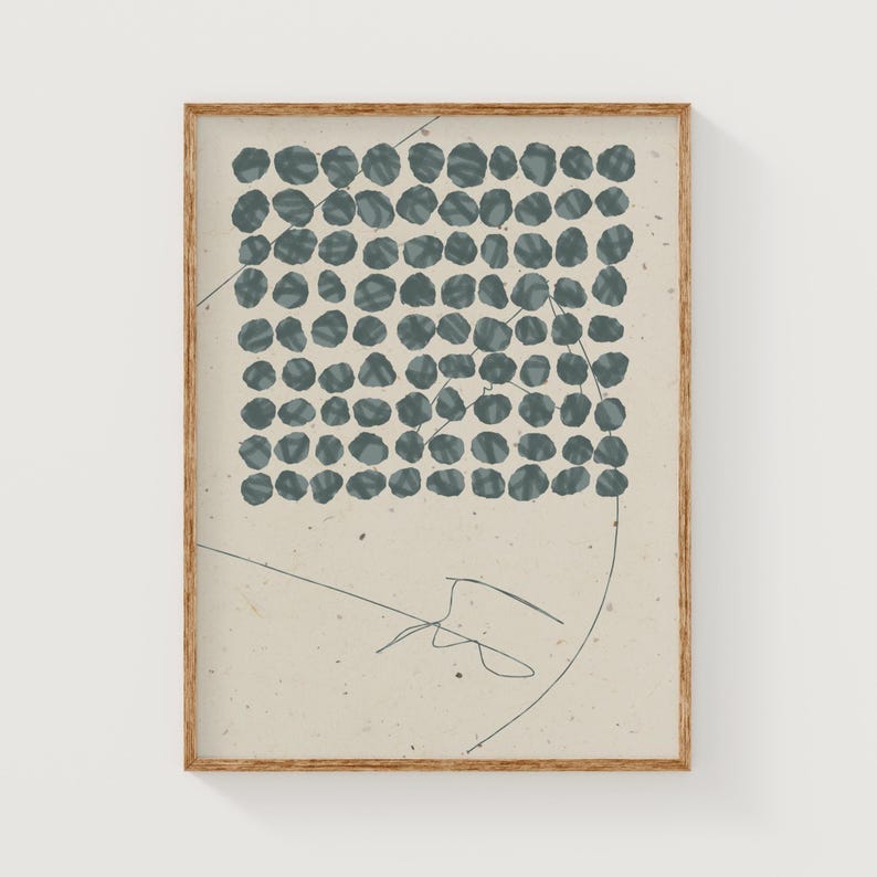 May include: A framed print with a beige background and a pattern of blue circles in the upper left corner. A thin, blue line curves across the background.
