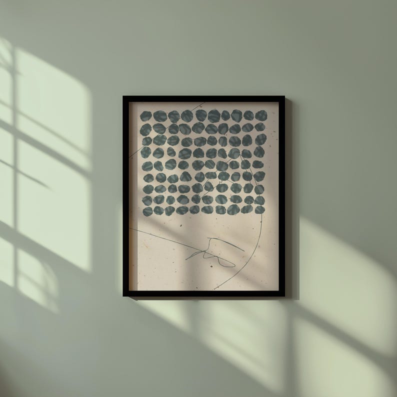 May include: A framed print with a black frame and a white background. The print features a grid of dark blue circles.