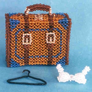 May include: A small brown beaded suitcase with blue trim and a white beaded handle. A black wire hanger and a white beaded bra are also pictured.