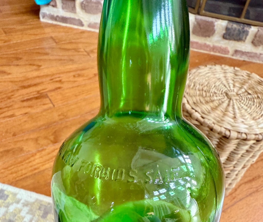 Vintage Green Glass Liquor Bottle – Embossed 