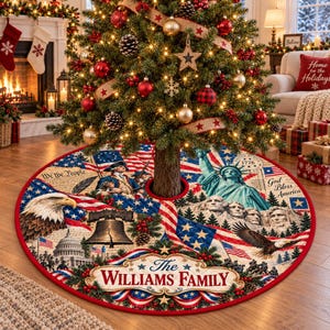 May include: A round Christmas tree skirt featuring a patriotic American theme with images of the Statue of Liberty, Mount Rushmore, the Liberty Bell, and a bald eagle. It includes the text The Williams Family, We The People, and God Bless America.