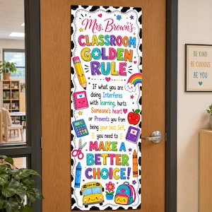 May include: A vertical classroom door sign with a black and white cow print border. The text reads Mrs. Brown's CLASSROOM GOLDEN RULE. It includes colorful illustrations of a pencil, notebook, calculator, scissors, apple, bus, and backpack.