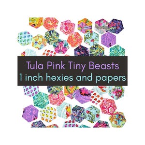 May include: A collection of 1 inch fabric hexies featuring Tula Pink Tiny Beasts patterns in various colors including pink, purple, green, and blue. A dark rectangular overlay displays the text: Tula Pink Tiny Beasts 1 inch hexies and papers.