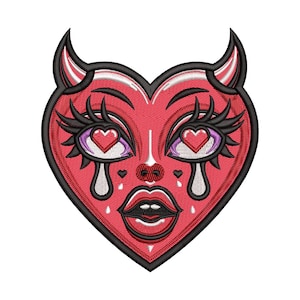 May include: Embroidered patch in the shape of a red heart with devil horns. The heart features a face with large eyes, long eyelashes, and a heart-shaped pupil. The mouth is open, and there are teardrops.