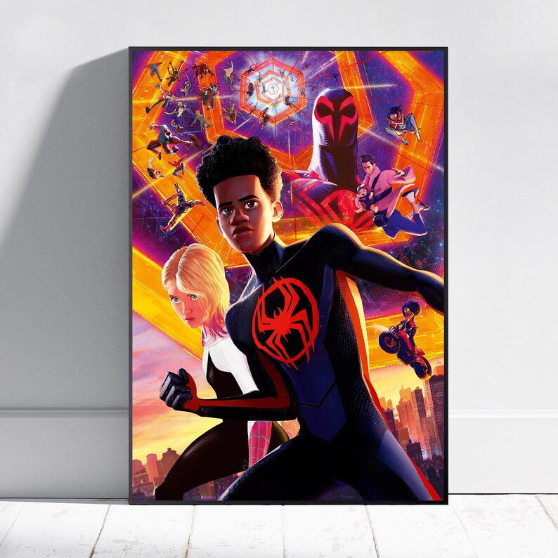 May include: A framed poster featuring characters from an animated film. The central figures are a young man in a black and blue suit with a red spider emblem and a blonde woman in a white and black suit. The background is a vibrant mix of orange, purple, and blue.
