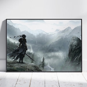 May include: A lone figure in dark clothing stands on a rocky cliff overlooking a misty mountain valley. The figure is holding a sword and is looking out at the view. The mountains are covered in fog and snow, and the sky is a pale blue.