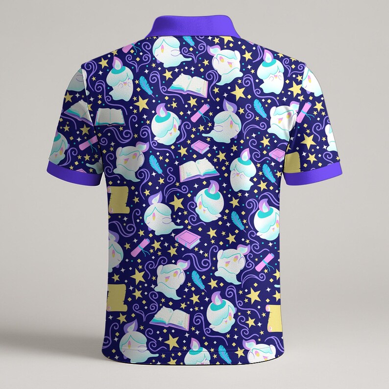 May include: A short-sleeved polo shirt with a dark blue background and a repeating pattern of cartoon candle-like figures, books, stars, and feathers. The collar and sleeve cuffs are purple.
