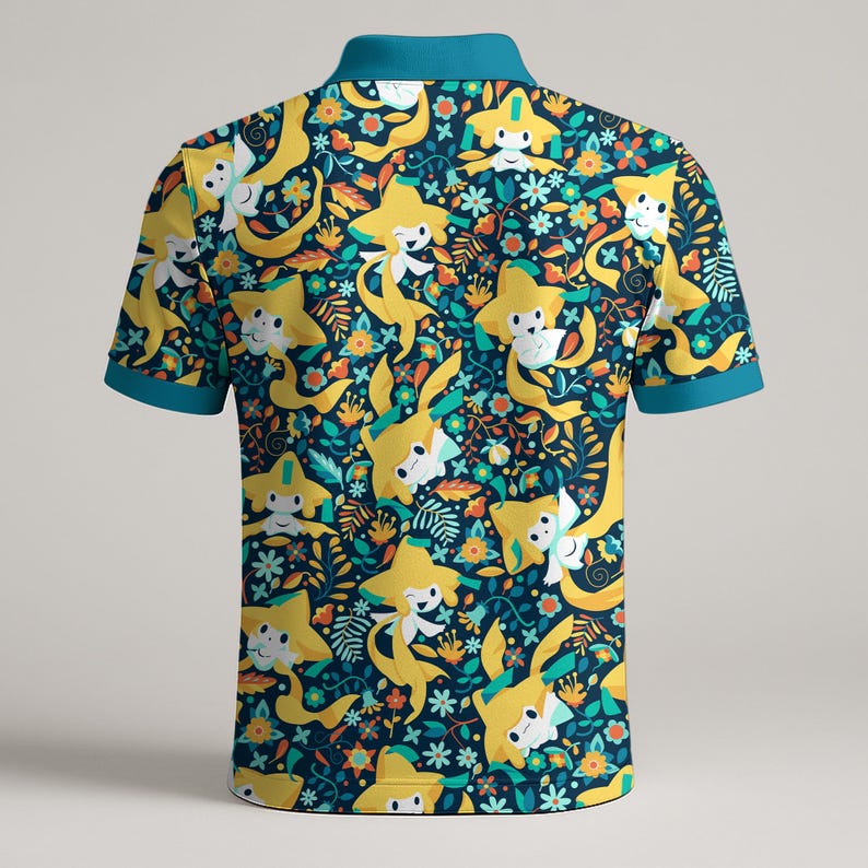 May include: A polo shirt with a navy blue background and a repeating pattern of yellow cartoon characters and floral elements. The collar and sleeve cuffs are teal.