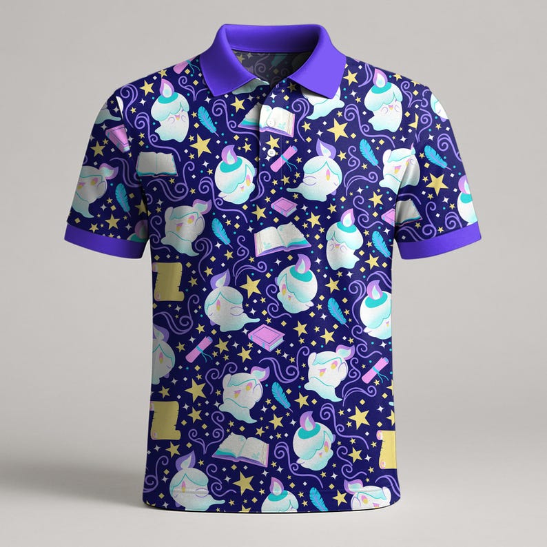 May include: A navy blue polo shirt with a repeating pattern of cartoon-like candle figures, books, feathers, and stars. The shirt has a purple collar and sleeve cuffs. The design features yellow, light blue, and white elements.