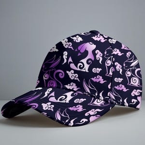 May include: A navy blue baseball cap featuring a repeating pattern of stylized purple creatures and cloud shapes. The cap has a curved brim and a structured crown, offering a stylish accessory.