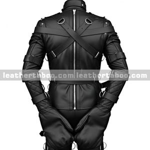 May include: Black leather jacket with a high collar, multiple straps, and metal rings. The jacket features a full-length zipper down the back and quilted detailing on the sleeves. The gloves are attached to the jacket.