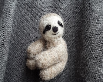 Luiaard Broche