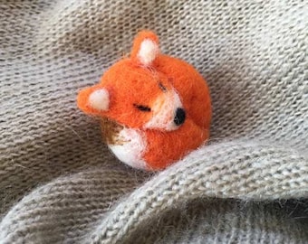 Broche slapende vos