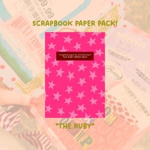 May include: A rectangular scrapbook paper pack with a bright pink background featuring a repeating pattern of lighter pink stars. The center label displays the text "scrapbook paper by collected haus" and "THE RUBY PAPER PACK" in white.
