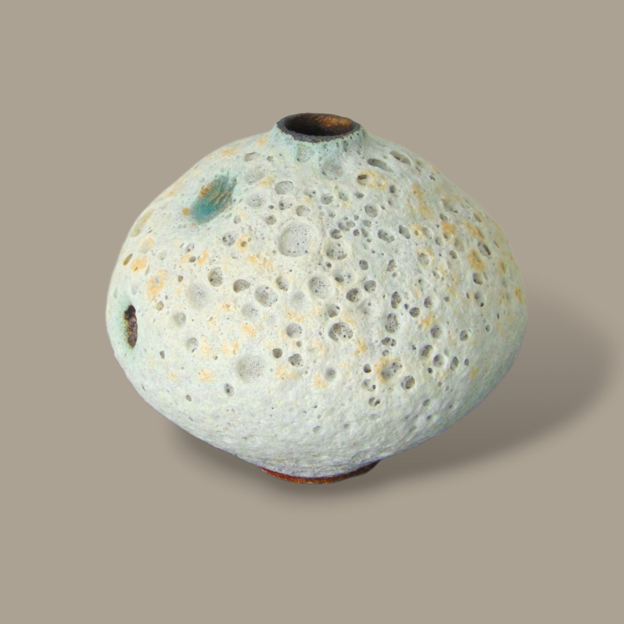 Small volcanic crater texture  bottle