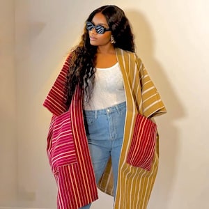 Aso Oke Kimono , with vibrant colors, made with high quality fabric that is suitable for all. it is a one size fits.