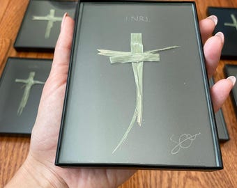 Hand crafted palm cross in frame