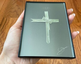 Hand crafted palm cross in frame