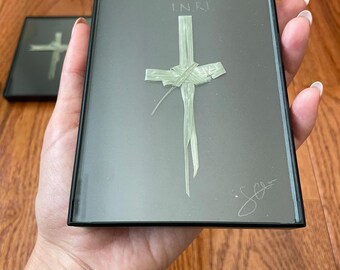 Hand crafted palm cross in frame