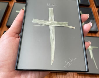 Hand crafted palm cross in frame
