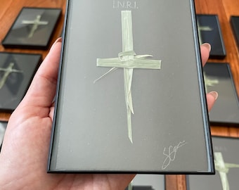 Hand crafted palm cross in frame