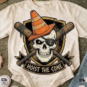 May include: Cream-colored t-shirt featuring a skull wearing an orange traffic cone hat and an eye patch with an anchor. Crossed baseball bats are behind the skull, and the text "HOIST THE CONE" is below.