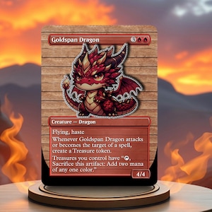 Puede incluir: Una carta de Magic: The Gathering de Goldspan Dragon roja y dorada con una ilustración de un dragón de dibujos animados lindo. El texto de la carta dice "Whenever Goldspan Dragon attacks or becomes the target of a spell, create a Treasure token. Treasures you control have "Sacrifice this artifact: Add two mana of any one color."