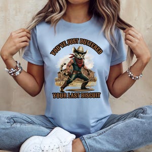 Funny Cowboy Cat Shirt, Western Graphic Tee, Southern Saying T-Shirt, Country Humor Gift, You&#39;ve Buttered Your Last Biscuit Tee
