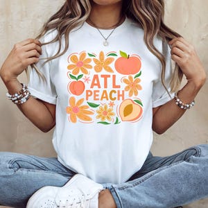 ATL Peach Graphic Tee: Retro Southern Flower Shirt