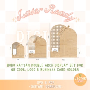May include: A set of three laser-ready, wooden Boho rattan double arch display stands. The largest is 15 inches tall, the medium is 10 inches, and the smallest is 7 inches. Each has a rattan-style upper section and a base for QR codes, logos, and business cards.