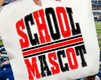 May include: A white t-shirt featuring the text SCHOOL MASCOT in a distressed, bold font. The word SCHOOL is printed in black and red, followed by two horizontal red lines, and the word MASCOT in black and red lettering on the lower half.