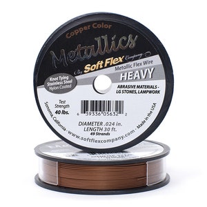 May include: A spool of copper colored Soft Flex Metallics Heavy wire for jewelry making and crafts. The spool is labeled with the brand name, product name, and details like test strength, diameter, length, and number of strands. The spool is made in the USA.