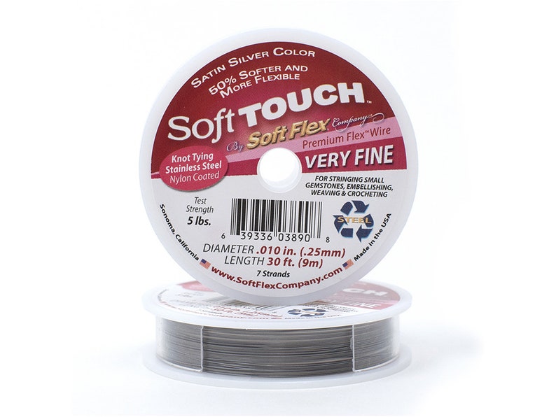 May include: Two spools of Soft Touch Very Fine beading wire. The label reads "Satin Silver Color" and "Knot Tying Stainless Steel Nylon Coated." The wire is .010 in. (.25mm) diameter and 30 ft. (9m) long. The wire is for stringing gemstones, embellishing, weaving, and crocheting.