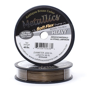 May include: A spool of antique brass colored Soft Flex Metallics Heavy wire. The spool is labeled with the brand name, wire type, and test strength of 40 lbs. The wire is 0.024 inches in diameter and 30 feet long. It is made in the USA.