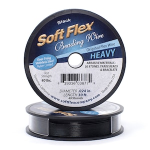 May include: A spool of black Soft Flex Beading Wire, labelled "Heavy", with a test strength of 40 lbs, a diameter of 0.024 inches, and a length of 30 feet. The spool is made in the USA and is designed for use with abrasive materials like large stones, trade beads, and bracelets.